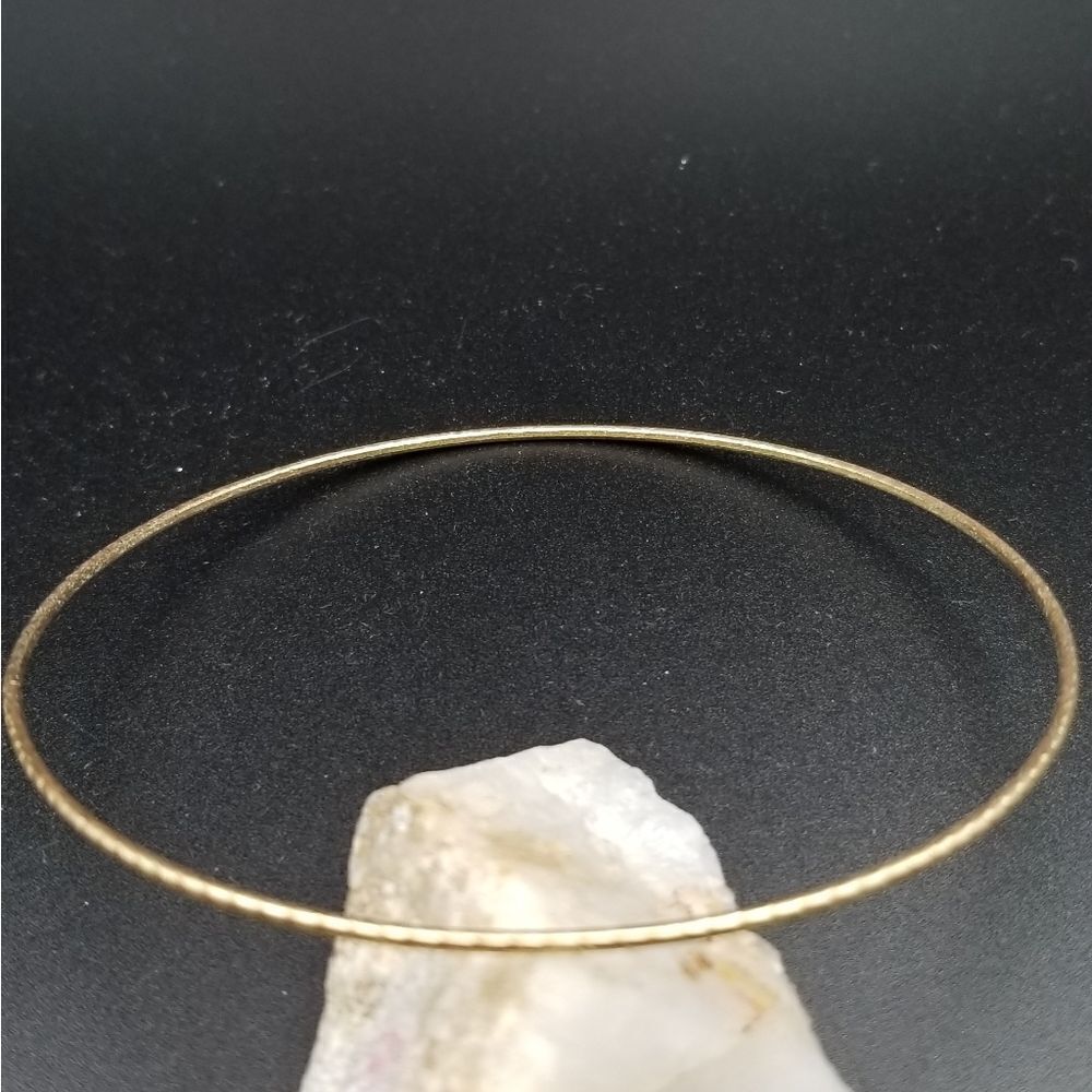 Gold tone scale bracelet. B710